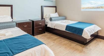 Two beds inside a bedroom at FHE Health's residential drug treatment in Florida