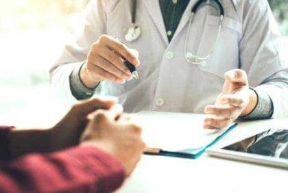 Doctor talking to patient